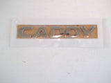 Volkswagen CADDY chrome badge - rear door - BRAND NEW - GENUINE VW - ITALIC 2K5